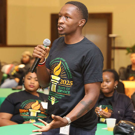 symposium attendee with mic